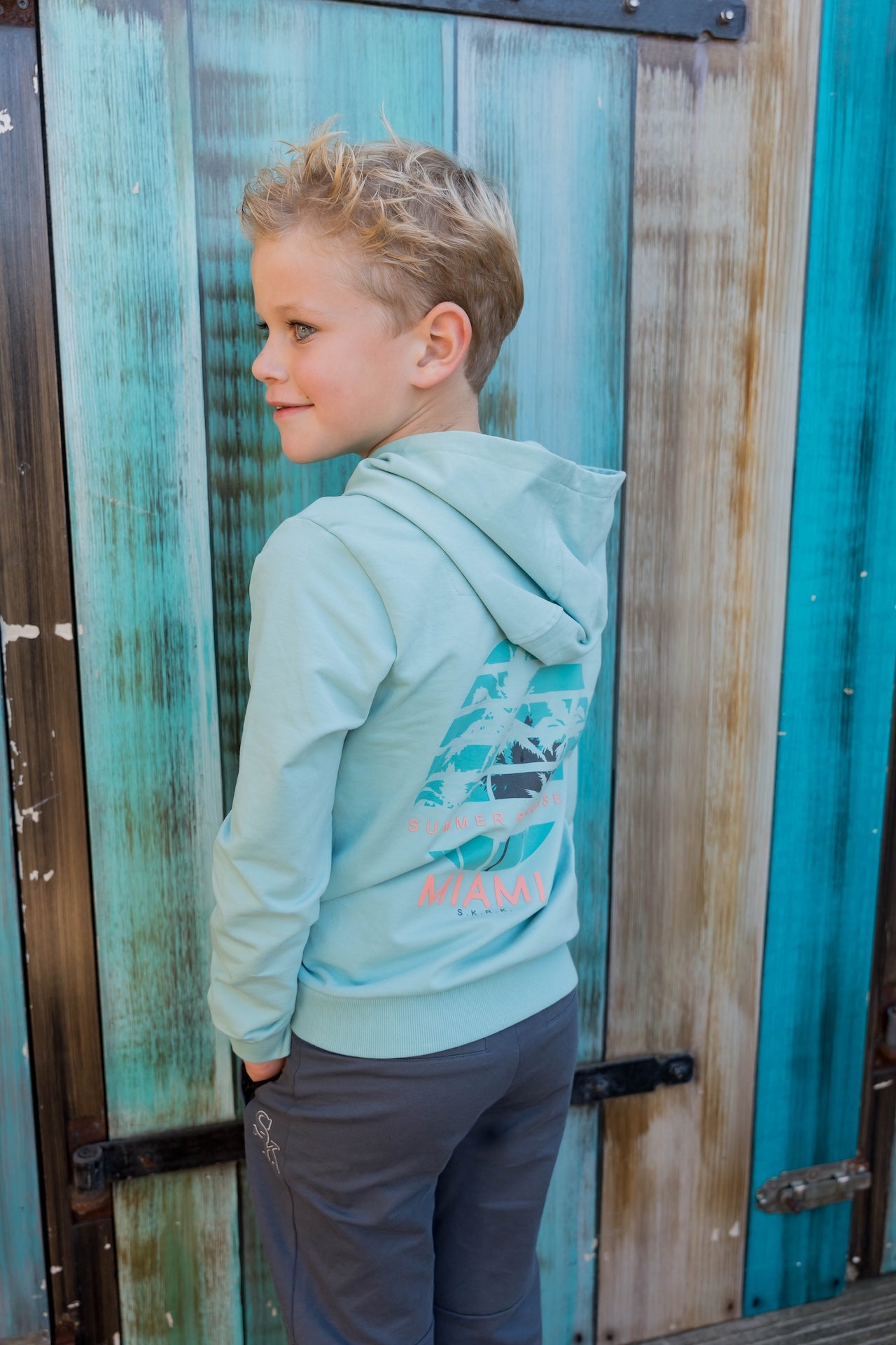 Skurk - Sweat à capuche backprint turquoise Sunil
