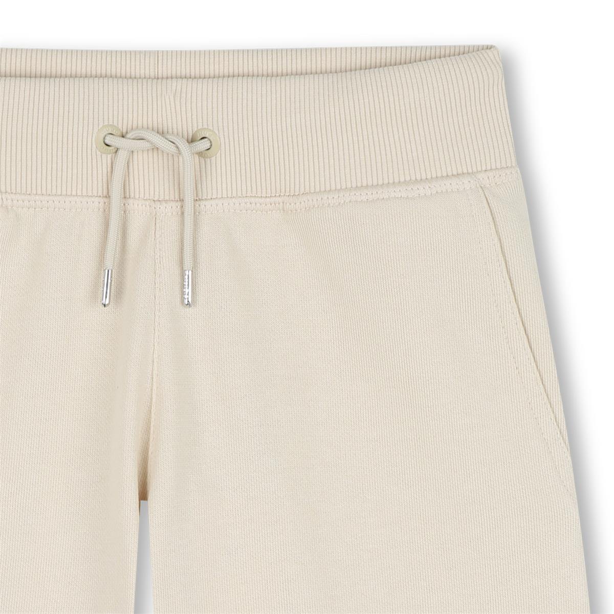 Hugo - Beige jogging shorts & small relief logo on the lower leg